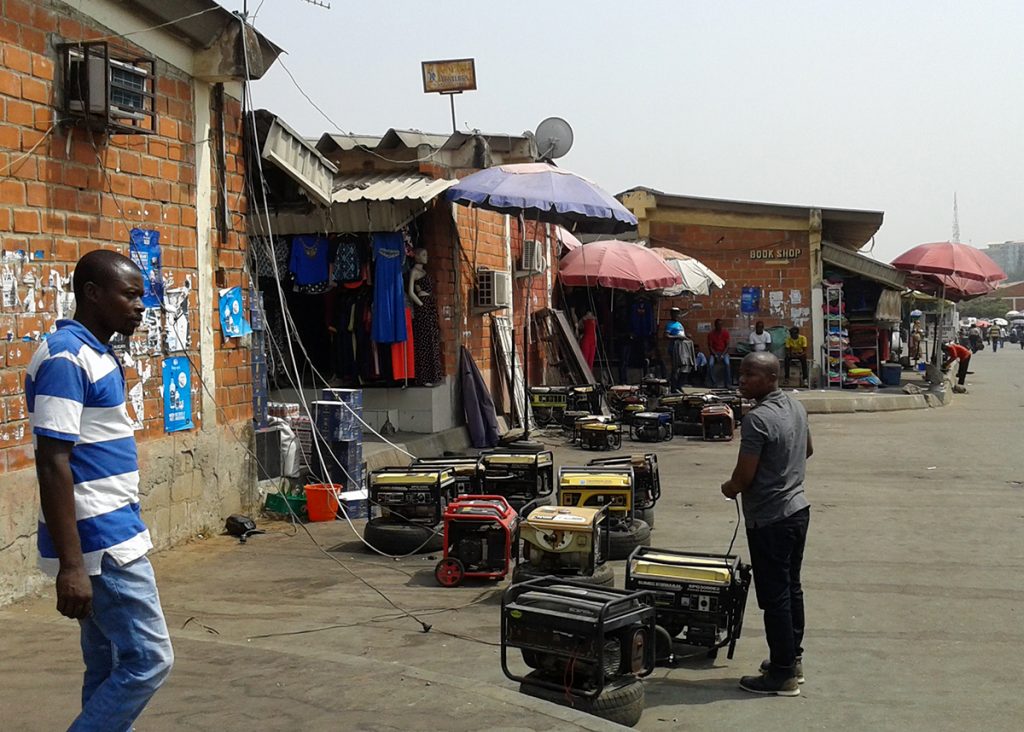 Fossil fuel generators powering one of Abuja's main markets, the Wuse Market